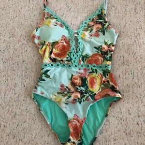BECCA floral one piece swim